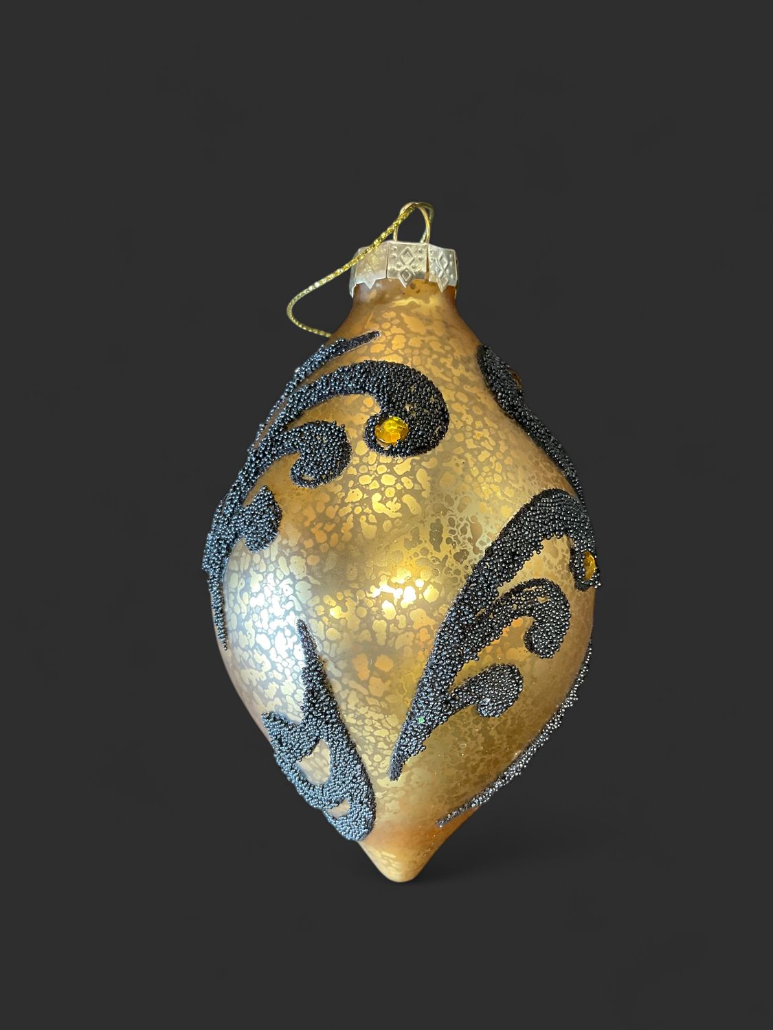 Mercury gold/black finial