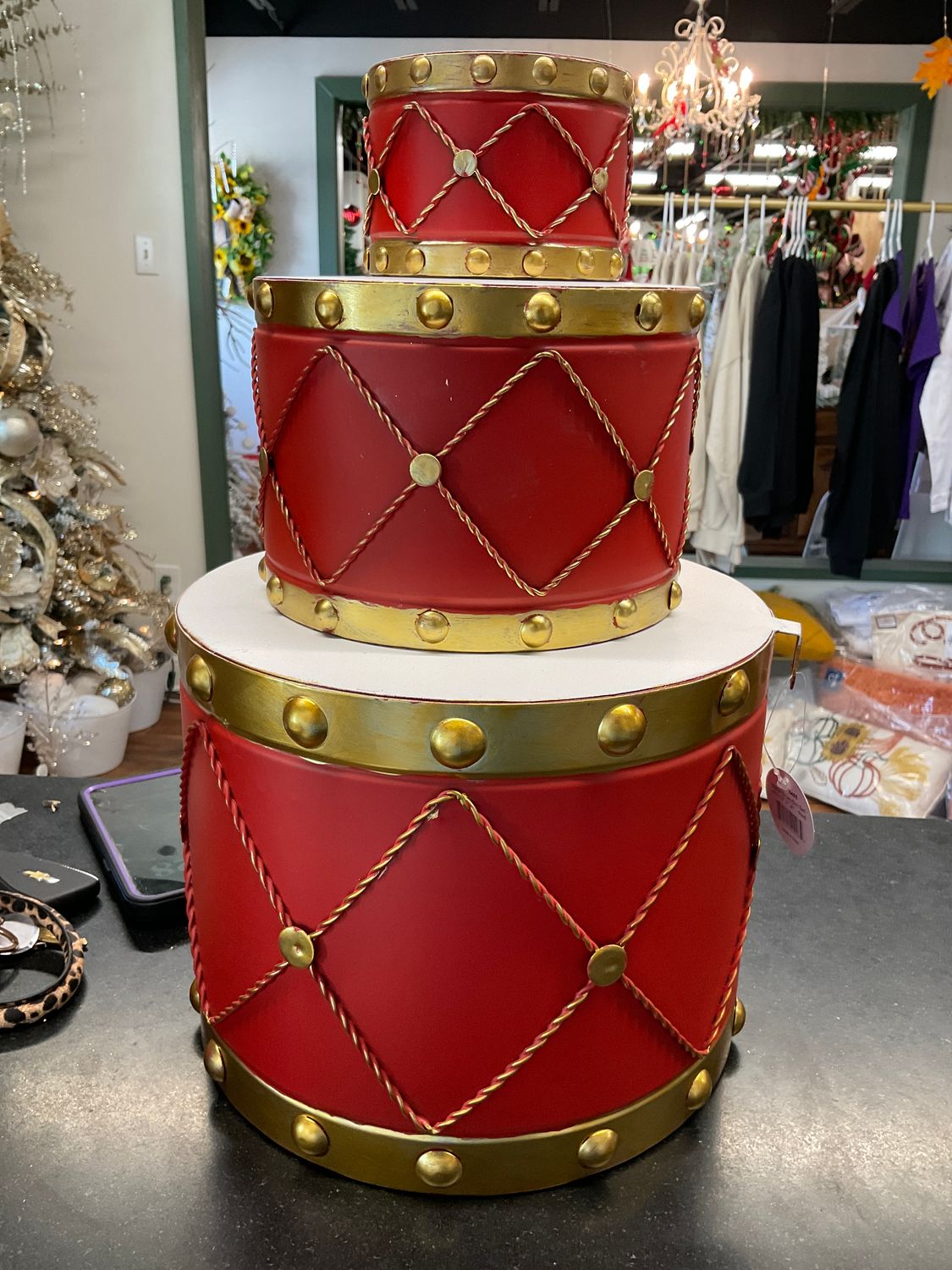 Red and gold three-piece drum set