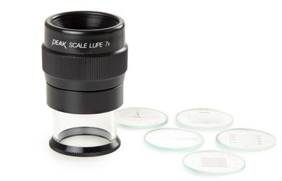 Lente di misurazione ingrandimento 7x oculare Ø 18 mm. Campo della cintura 24 mm. con 5 scale intercambiabili per misure angolari, di spessore e lineari