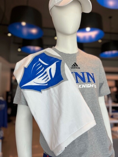 White towel with royal blue, gray and white spirit logo on the front.