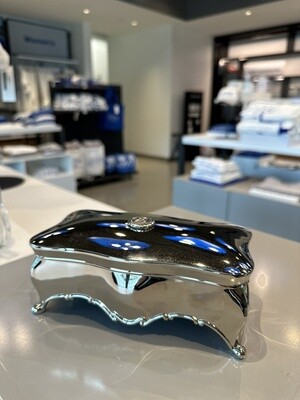 silver box with seal logo on the lid.