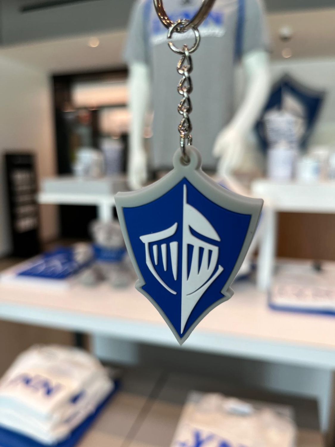 royal blue, gray and white spirit logo keychain.