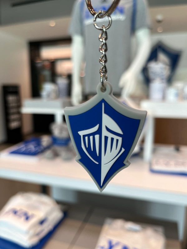 royal blue, gray and white spirit logo keychain.