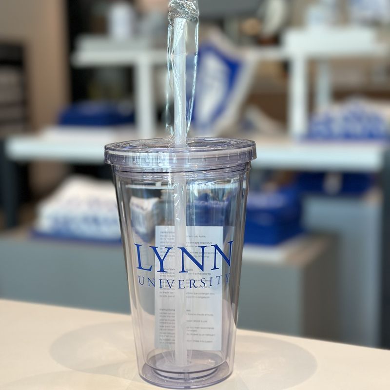 Clear tumbler with a clear straw and blue lettering saying &quot;Lynn University.&quot;