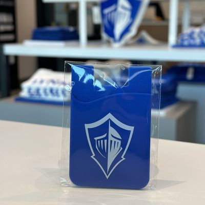 royal blue and white silicone phone wallet with spirit logo on the front.