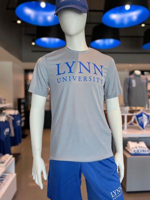 Gray short-sleeve athletic shirt with blue lettering on the front saying &quot;Lynn University.&quot;