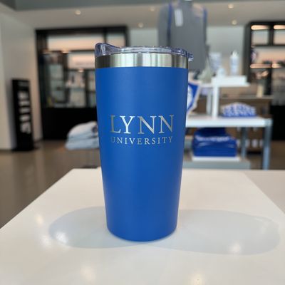 royal blue and silver insulated tumbler with silver lettering on the front saying &quot;Lynn University.&quot;