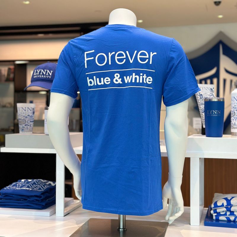 Royal blue short-sleeve t-shirt with white lettering on the front and back. On the front it says &quot;Lynn University&quot; and on the back it says &quot;forever blue &amp; white.&quot;
