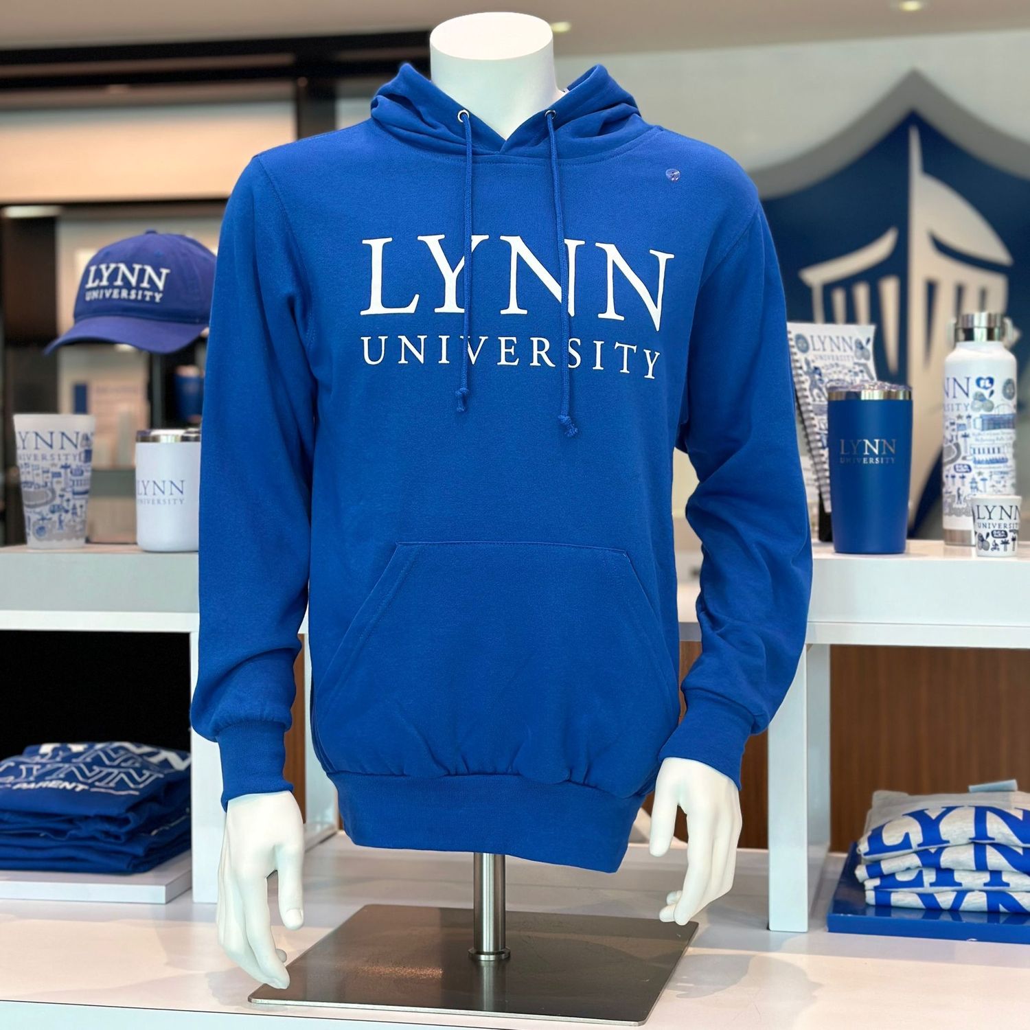 Fleece hoodie that comes in royal blue and white, it has white lettering on the front that says &quot;Lynn University.&quot;