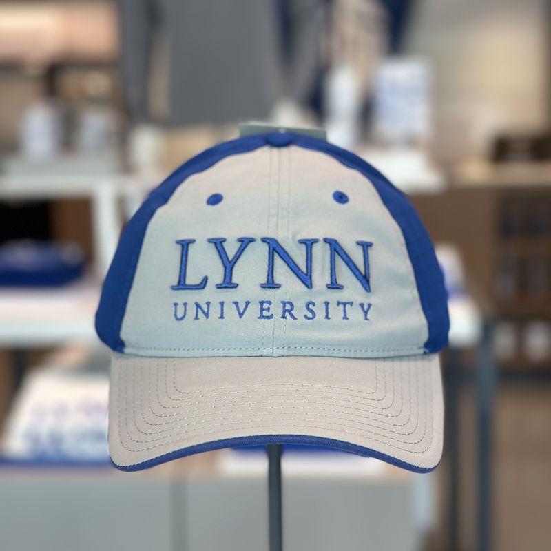 choice between gray/blue and white/gray dri-fit hat, with text saying &quot;Lynn University.&quot;