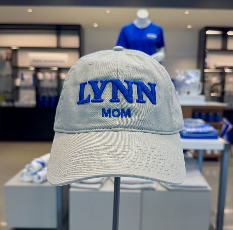 Gray hat with royal blue text on the front saying &quot;Lynn Mom.&quot;