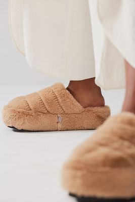 The It’s A Vibe Platform Slippers are trendy, comfortable slip-on shoes that combine a cozy feel with a stylish platform design.



