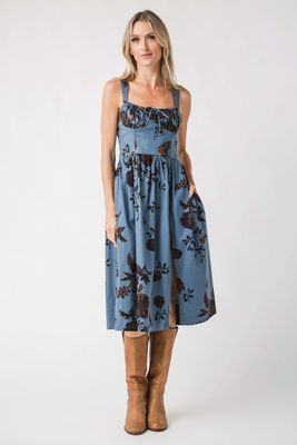 The Laters Baby Midi Dress by Free People is a stylish and feminine dress that blends comfort with a touch of romance. Featuring a flattering midi length, it typically includes a v-neckline and adjustable straps for a customizable fit.