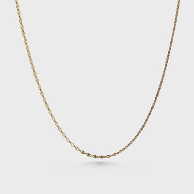 The Lanikai Moonrise Necklace by Cove Fine Jewelry is a refined and elegant piece that features a sophisticated, solid gold chain.