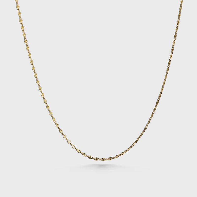 The Lanikai Moonrise Necklace by Cove Fine Jewelry is a refined and elegant piece that features a sophisticated, solid gold chain.
