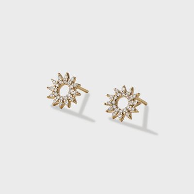 The Cape Sunrise Natural Diamond Studs by Cove Fine Jewelry are elegant and timeless earrings featuring natural diamonds set in a sun-shaped stud design. 