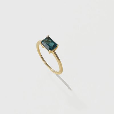 The Pleasant Bay London Blue Topaz Ring by Cove Fine Jewelry is a stunning piece featuring a vibrant London blue topaz gemstone. 