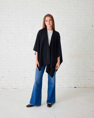 The Luxy Wrap by Mersea is a luxurious and versatile accessory designed for both style and comfort. 
