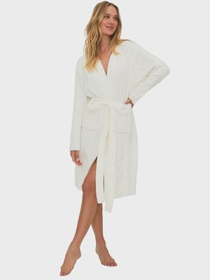 The Rinna Robe by Beach Riot is a stylish and lightweight robe, perfect for lounging or as a chic cover-up. Made from soft, breathable fabric, it features a relaxed, comfortable fit with a wrap-around design and a tie waist for a customizable silhouette. 