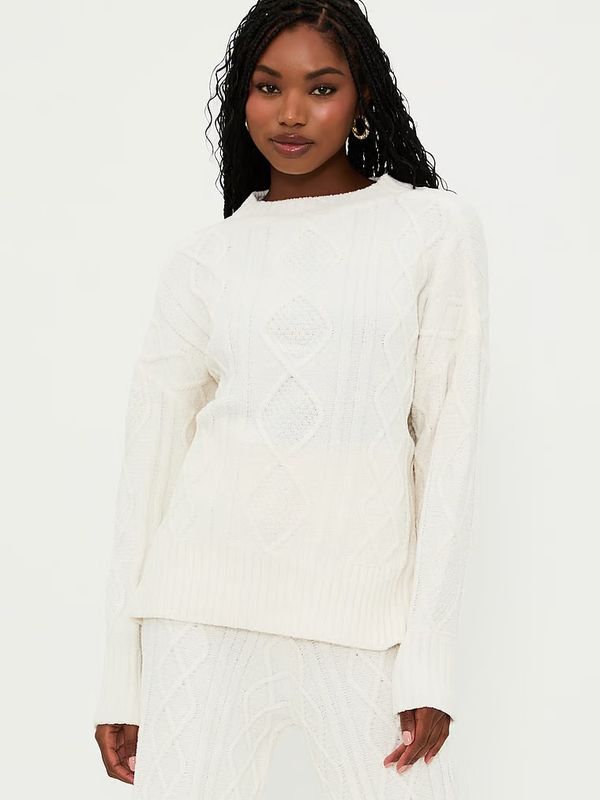 The Callie Sweater by Beach Riot is a cozy, stylish knit sweater perfect for cooler weather. It features a relaxed, slightly oversized fit with a flattering crew neckline and ribbed detailing at the cuffs and hem. 