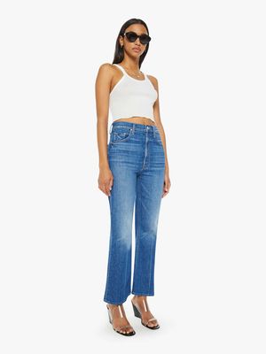 The Scooter Ankle Jean by MOTHER is a high-rise, slim-fitting jean with a cropped ankle length. Known for its flattering fit, the jean hugs the body from the waist through the thigh, and the ankle-length cut makes it perfect for showcasing shoes. 