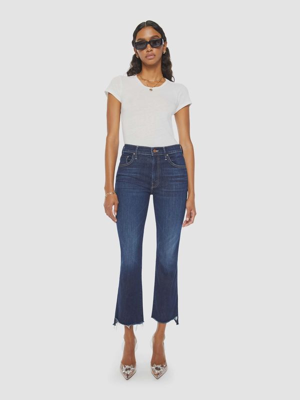 The Insider Crop Step Fray Jean by MOTHER is a high-rise, skinny jean with a cropped length and a frayed hem for a relaxed, laid-back look. The &quot;step fray&quot; detail adds an edgy touch, with the hem slightly uneven and unfinished for a modern, cool vibe.