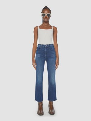 The Hustler Ankle Jean by MOTHER is a high-rise, slim-straight jean with a cropped ankle length, designed to highlight shoes or boots. Known for its flattering fit, it offers a sleek silhouette that hugs the waist and thighs, with a slight stretch for comfort. 
