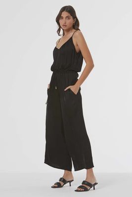 The Annabelle Jumpsuit by YFB is a chic, all-in-one outfit designed for both comfort and style. Featuring a flattering, relaxed fit, it typically has a sleeveless or short-sleeve design with a v-neckline, offering a casual yet polished look.