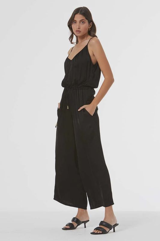 The Annabelle Jumpsuit by YFB is a chic, all-in-one outfit designed for both comfort and style. Featuring a flattering, relaxed fit, it typically has a sleeveless or short-sleeve design with a v-neckline, offering a casual yet polished look.