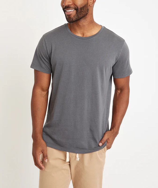 The Solid Signature Crew Tee by Marine Layer is a classic, everyday t-shirt known for its soft, breathable fabric and comfortable fit. Made from a blend of high-quality materials, it offers a luxurious feel against the skin while maintaining durability. 