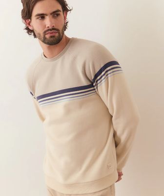 The Cloud 9 Fleece Crewneck by Marine Layer is a soft, cozy sweatshirt designed for ultimate comfort. Made from a plush, fleece-lined fabric, it offers a luxurious feel against the skin. 