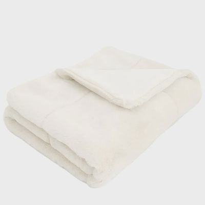 The Mon Ami Butter Blanket is an ultra-soft, cozy throw blanket designed for comfort and warmth. Made from plush, high-quality fabric with a buttery smooth texture, it provides a luxurious feel that’s perfect for snuggling. The blanket typically comes in neutral or calming colors, making it a versatile addition to any home decor. Ideal for use during chilly evenings or as a cozy accent piece, the Butter Blanket combines warmth with a gentle, soothing touch, making it an ideal gift or personal indulgence for creating a cozy, relaxing atmosphere.
