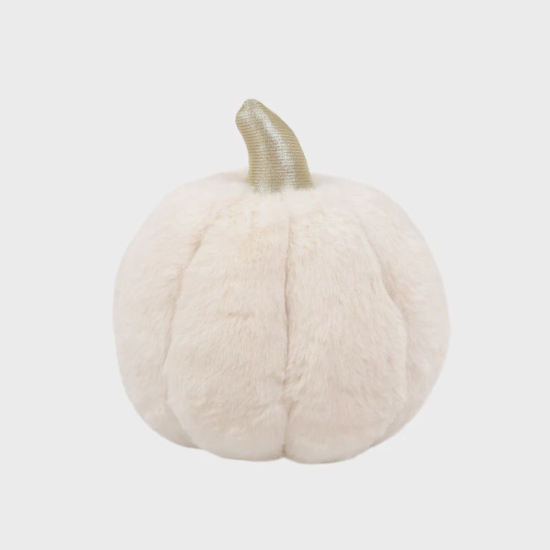 The Mon Ami Plush Pumpkin in White is a soft, whimsical decorative piece designed to resemble a pumpkin in a warm white color. Made from plush fabric, it offers a cozy and playful twist on traditional fall decor. The pumpkin is accented with subtle stitching and small details to enhance its charm, making it a perfect addition to autumn-themed displays, tablescapes, or seasonal decor. The White Plush Pumpkin combines a neutral, modern aesthetic with the warmth of fall, making it an ideal decoration for Halloween or Thanksgiving, as well as a versatile piece for year-round cozy vibes.