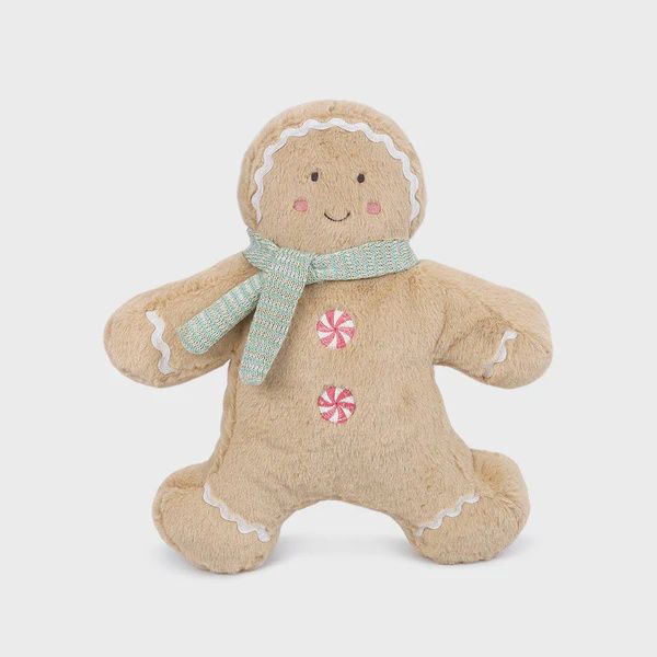 The Mon Ami Gingerbread Accent Pillow is a festive, cozy decorative pillow designed to resemble a cheerful gingerbread cookie. Made from soft, plush fabric, the pillow features charming details like embroidered frosting, buttons, and a smiling face, giving it a whimsical, holiday-ready look. Its warm, earthy tones and playful design make it a perfect addition to any holiday decor, whether on a couch, bed, or as part of a seasonal display. The Gingerbread Accent Pillow brings a sweet, comforting touch to your home, celebrating the festive spirit of the season in a fun and cozy way.