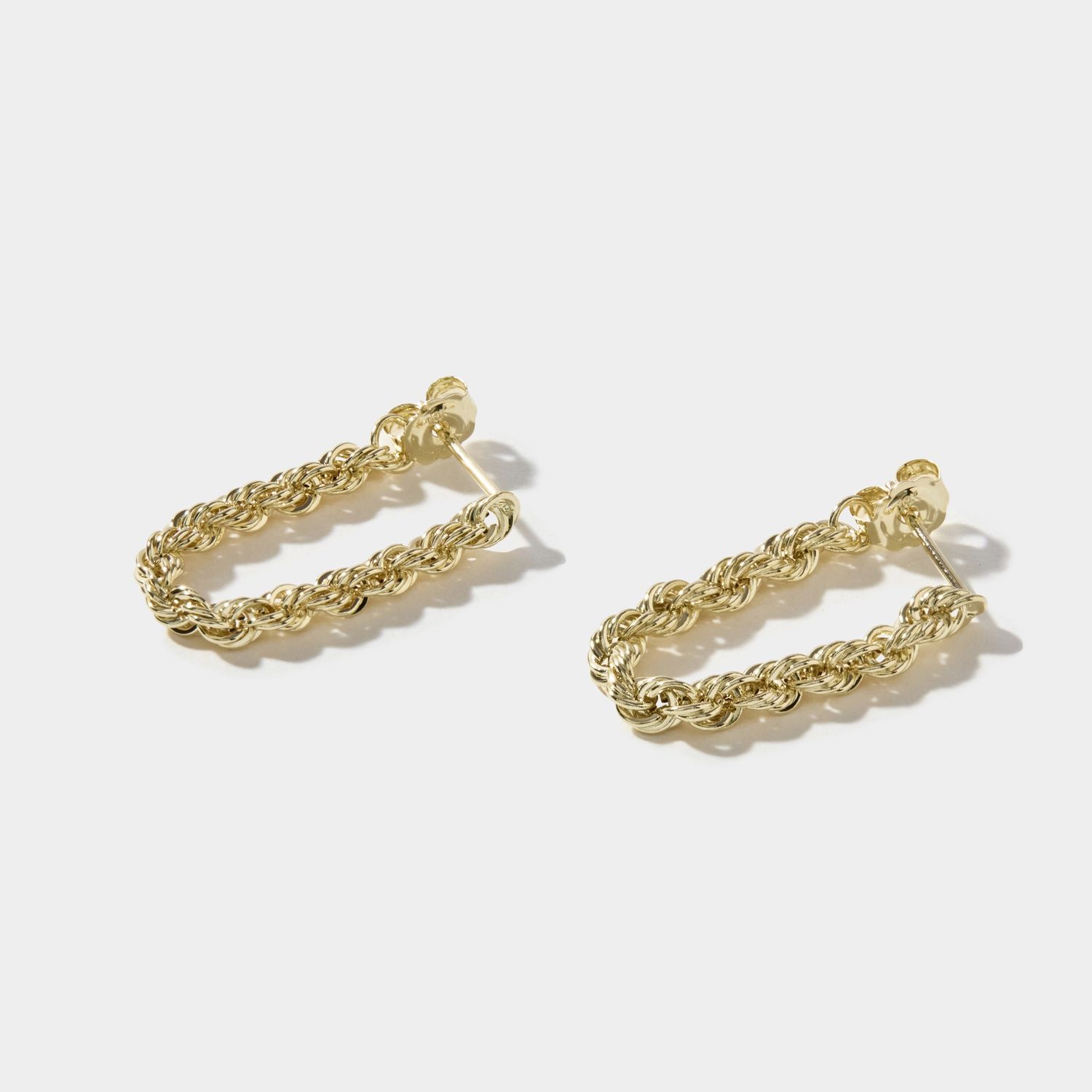 The Rope Dangle Earrings by Cove Fine Jewelry are a statement-making pair of earrings that combine elegance with a touch of texture. The rope texture gives them a modern, yet timeless feel, making them versatile enough to pair with both casual and formal outfits. 
