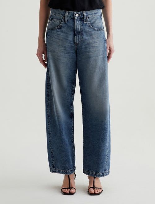 The Hattie Barrel Jean is a trendy, relaxed-fit jean featuring a barrel-shaped silhouette. 


