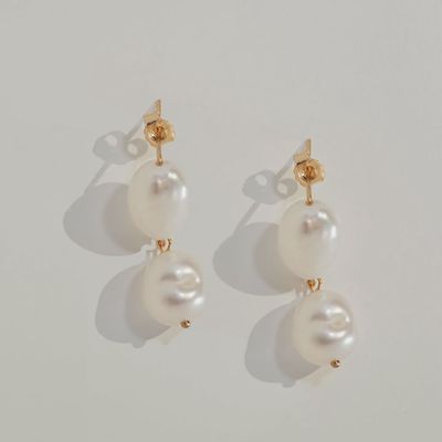 The Kozakh Badde Earrings are bold, statement earrings designed with a unique and contemporary flair. 