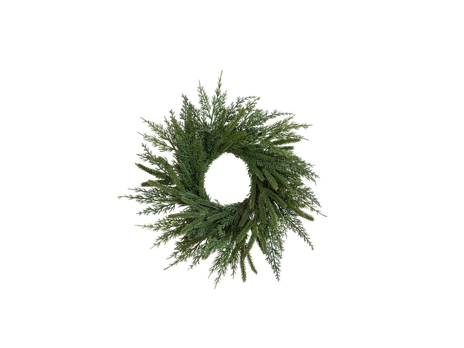 The Norfolk &amp; Cypress Mix Mini Christmas Wreath is a small, festive wreath that blends realistic Norfolk pine and cypress foliage. 