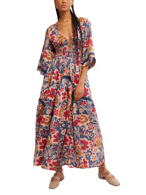 The Free People Printed Dixie Maxi Dress is a flowy, bohemian-inspired dress known for its vibrant, all-over print and relaxed, feminine silhouette. 