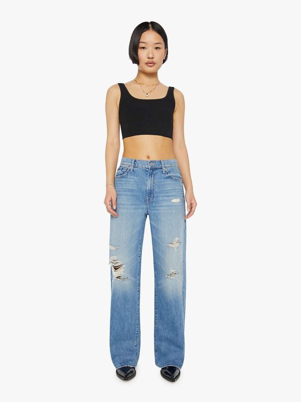 Mother&#39;s The Lil&#39; Dodger Sneak are a pair of denim jeans known for their stylish, vintage-inspired look and modern fit. These jeans typically feature a high-rise waist, and a slim through-the-hip cut, creating a flattering silhouette. 