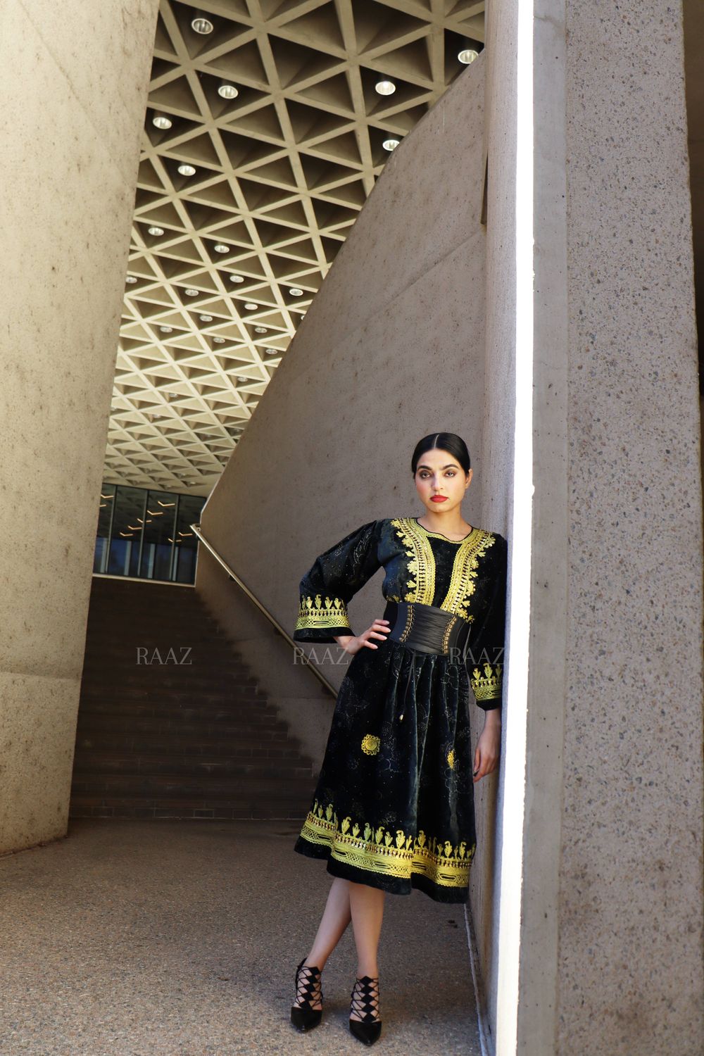 ​Black velvet elegance with golden embroidery