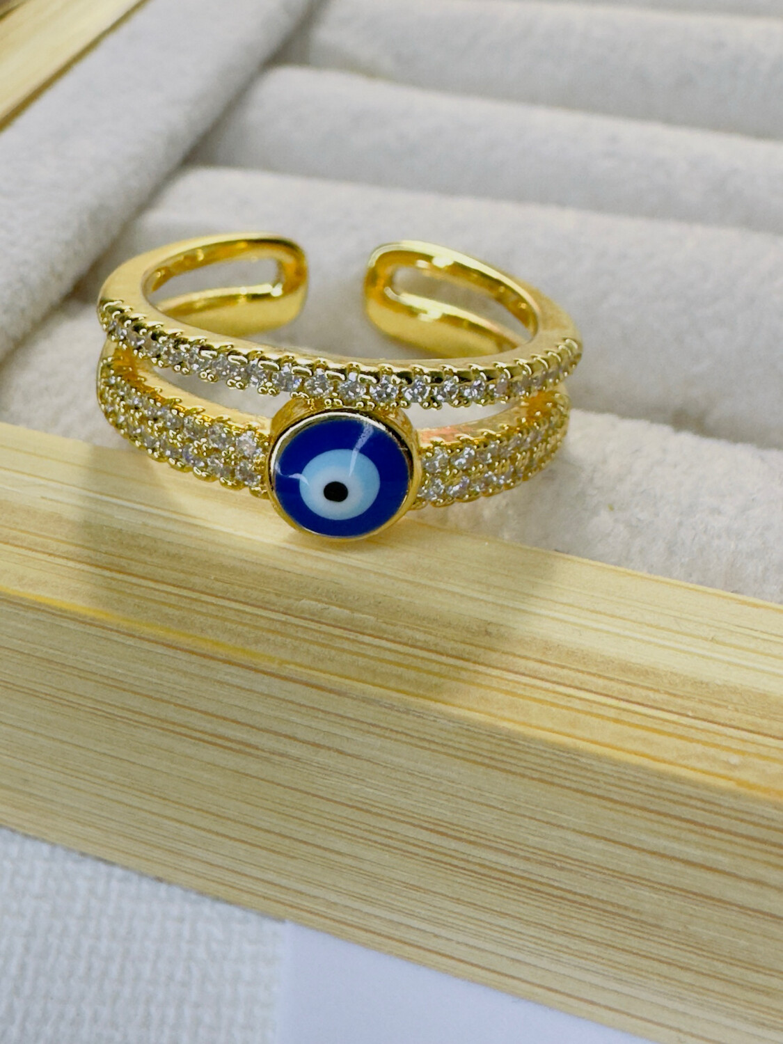 Anillo ajustable doble de ojo 