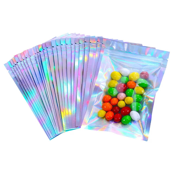 100   7.5cm x 10cm IRIDESCENT HOLOGRAPHIC/ CLEAR ZIP LOCK MYLAR BAGS (no contents in bags)