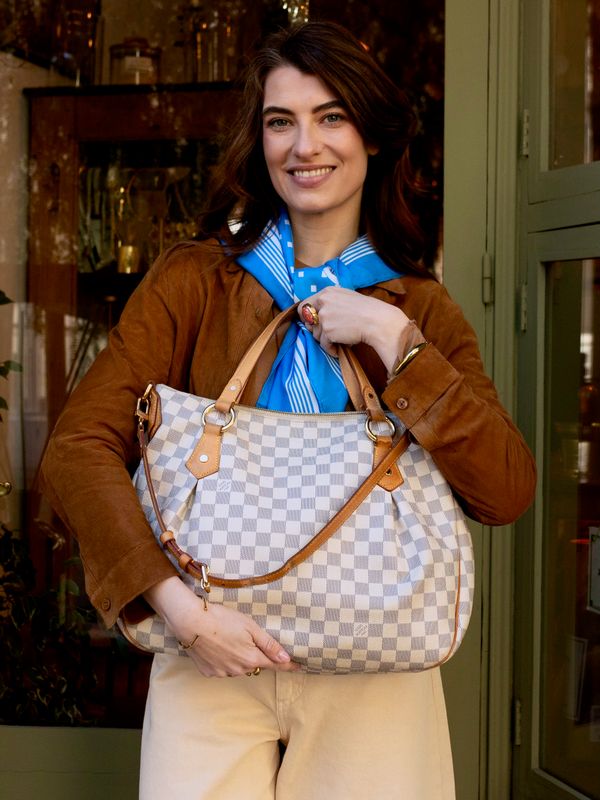 Louis Vuitton Evora MM Bag