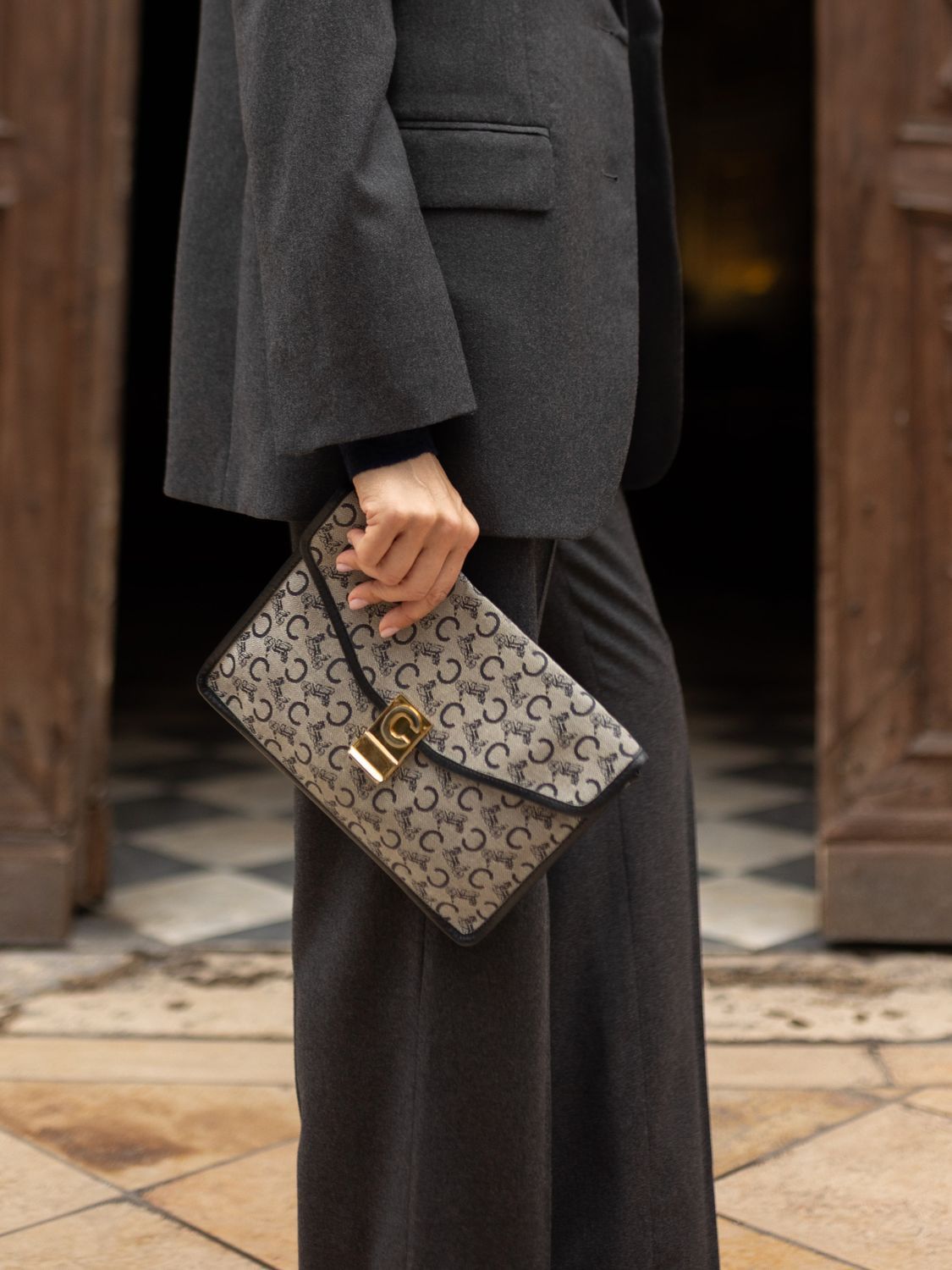 Reference photo with monogram clutch for size