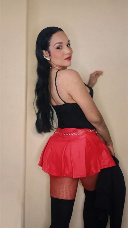 PLEATED FAUX LEATHER MINI SKIRT