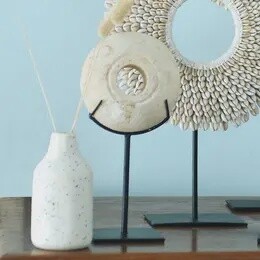 SUMBA SANDSTONE ORNAMENT ON STAND