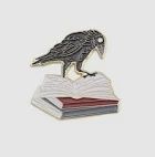 CROW ON BOOKS ENAMEL PIN