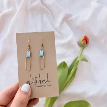 FROST BLUE LEATHER + BRASS OVAL HOOPS