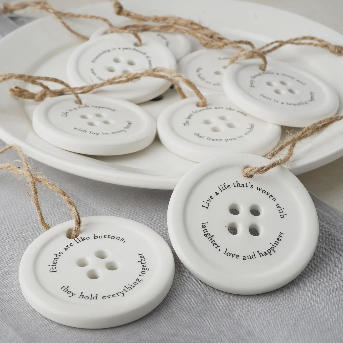 Asst ceramic button hanger
